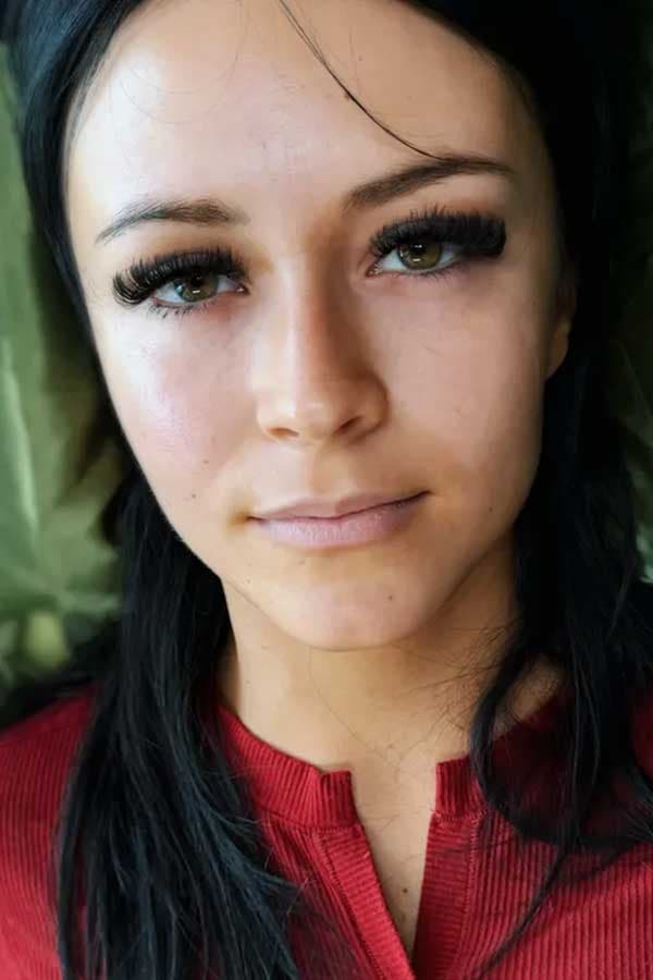 Close-up of a volume lash extension set on a client with hazel eyes.